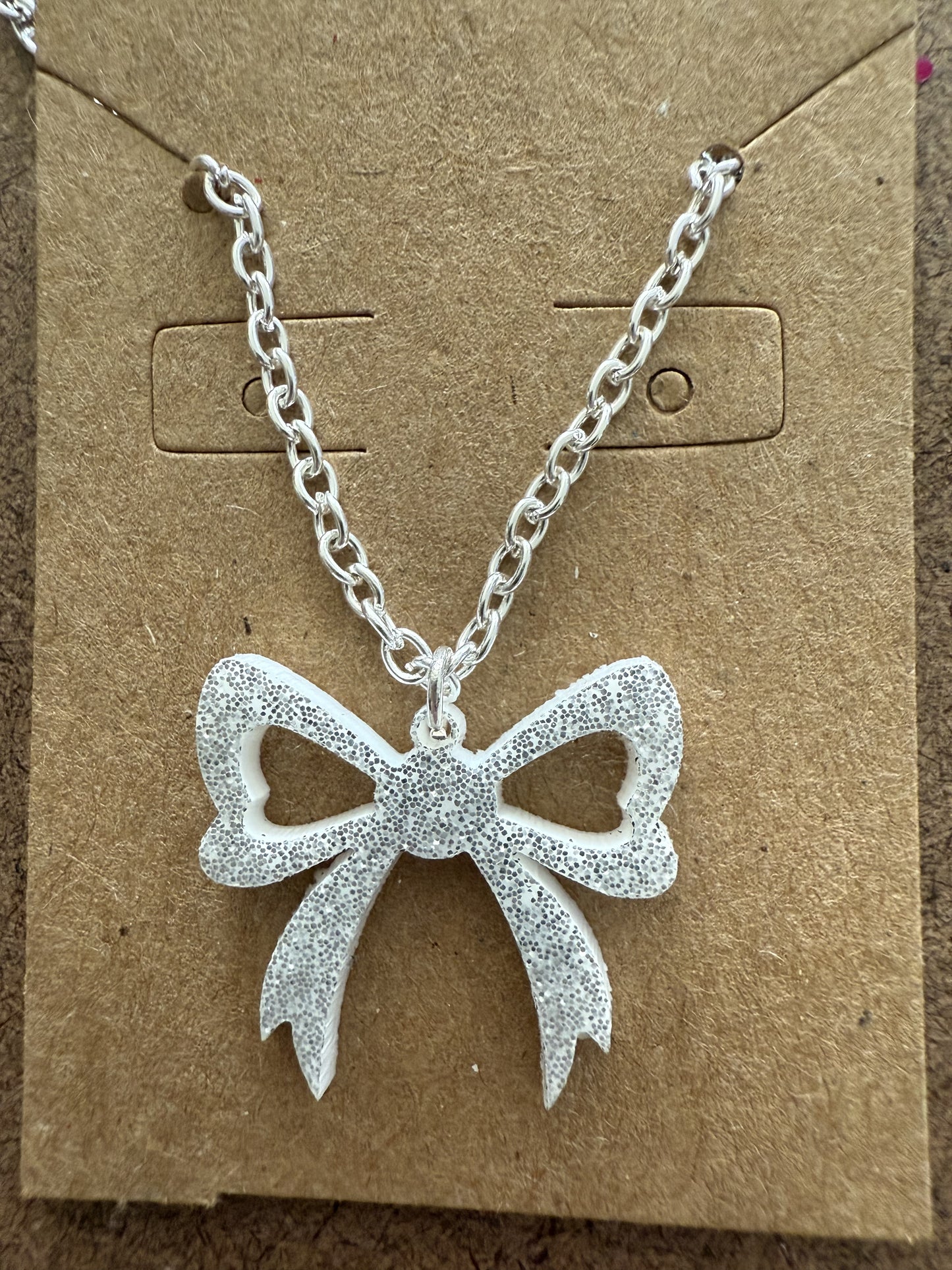 Small Silver Glitter Bow Necklace